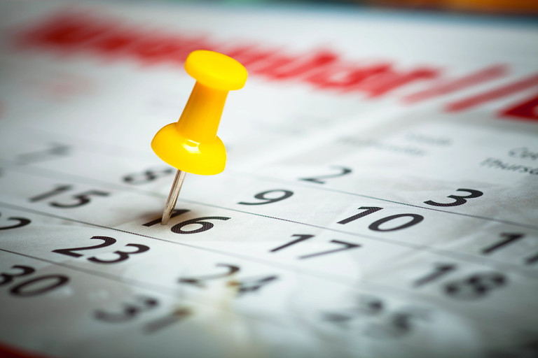 Close up of a pin in a calendar